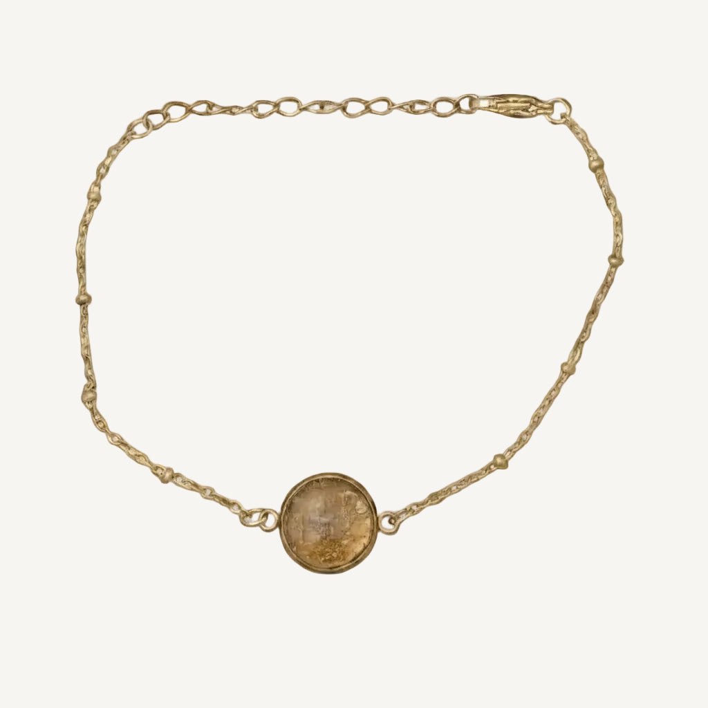 Guld armband med infattade 24K guldflakes från Nayuga Jewels