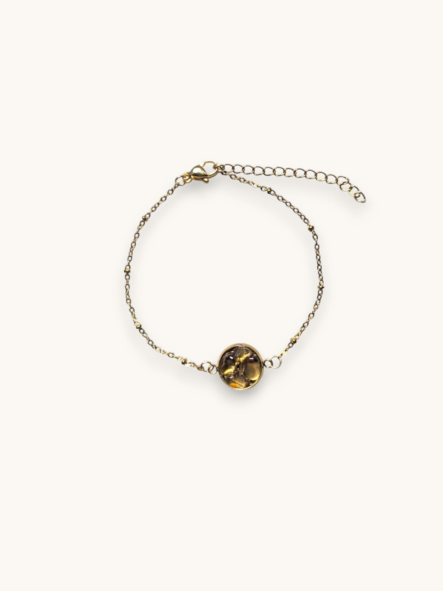 Citrinmagi armband med rund citrinsten och tunn ankarkedja i 18k guldpläterat rostfritt stål.