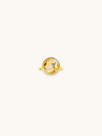 Citrinmagi justerbar ring i 18k guldpläterat stål med en rund, naturlig citrinkristall i organisk design.