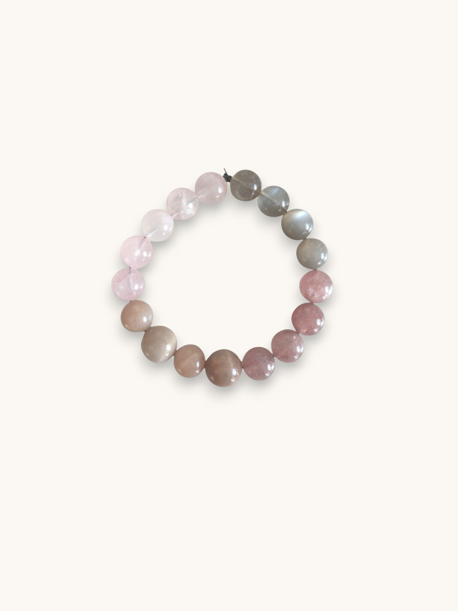 Citrinmagi kristallarmband med rosenkvarts, jordgubbskvarts och grå månsten i en mjuk rosa och grå gradient.