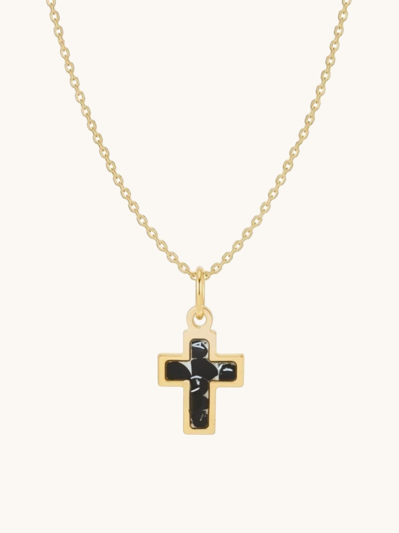 Citrinmagi halsband med korsberlock i 18k guldpläterat stål och inlägg av naturlig svart onyxsten.