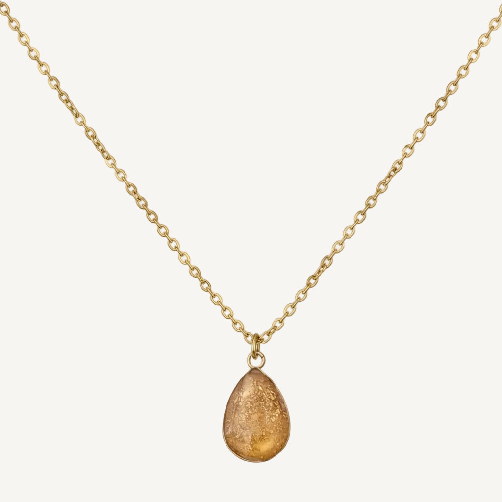 Halsband med droppformad fattning och äkta 24K guldflakes